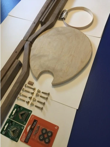 Guitar stand and stool parts before assembly.